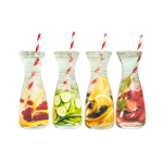 Glass jugs of water with straws and different types of fruit slices in them.